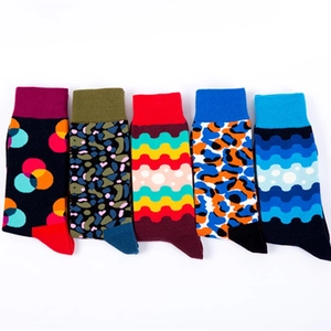 Five-pack of vibrant cotton socks with colorful geometric patterns and animal prints