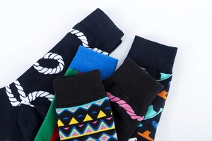 Detail shot of colorful cotton socks with geometric patterns and ribbed cuffs for winter