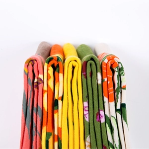 Five pairs of colorful floral mid-calf cotton socks in pink, yellow, and green tones