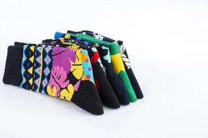 Detailed view of colorful patterned cotton crew socks with vibrant botanical and geometric motifs