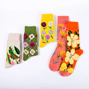 Set of five bright floral cotton mid-calf socks with daisy and sunflower patterns