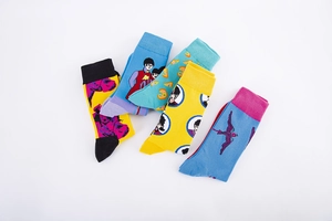 Artistic mid-calf socks featuring colorful portrait illustrations and abstract patterns