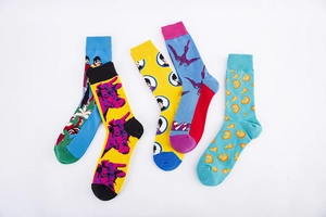 Detailed close-up of 5-pair colorful pop art socks featuring creative portrait illustrations