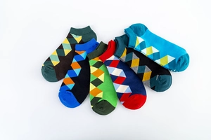 Close-up of 6-pack colorful diamond pattern ankle socks with ribbed cuffs