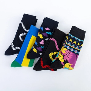 Five pack of casual cotton crew socks with colorful geometric and abstract patterns
