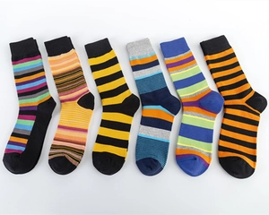 Detail view of multi-colored striped cotton crew socks for men with ribbed texture