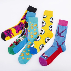 Five pairs of colorful pop art crew socks with diverse abstract illustrations on white base