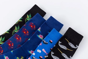 Detail view of cotton socks set featuring fun dragon, crab, and sushi patterns