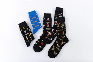 Artistic cotton crew socks set featuring creative patterns like tools and instruments