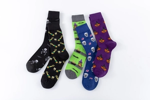 Detailed set of five Halloween themed crew socks with pumpkin, skull and cat patterns