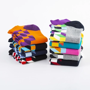 Men's stylish cotton crew socks featuring colorful geometric patterns and checkered prints