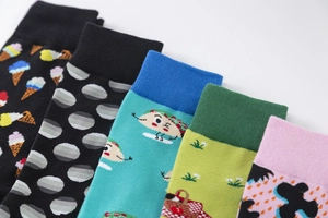 Detail of colorful cotton crew socks featuring ice cream, polka dots and cartoon patterns