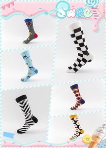Set of six colorful crew socks with fried egg, geometric, and novelty patterns in cotton