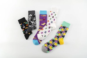 Detailed flat lay of five colorful crew socks with donut, pizza, and bear patterns