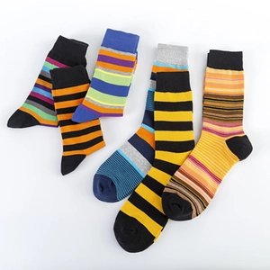 Five pairs of men's cotton crew socks with colorful vintage stripes and ribbed cuffs