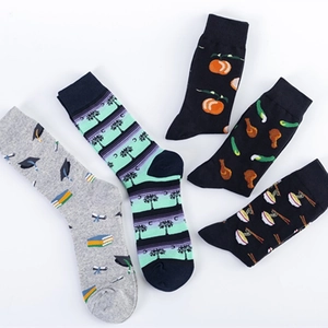Five-pack crew socks with creative patterns like graduation, tropical, and food themes