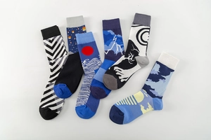 Artistic crew socks set featuring wave patterns and geometric jacquard knit textures