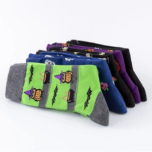 Halloween crew socks set with green owl print and striped patterns on white background
