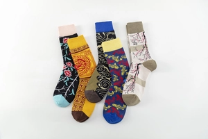 Detailed view of Asian style cotton socks featuring traditional floral and koi patterns