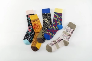 Detailed close-up of 5 pairs of cotton crew socks featuring Chinese koi and floral patterns