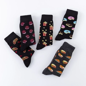 Pack of five mid-calf cotton socks with creative food patterns on dark background