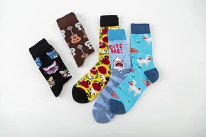 Flat lay of colorful mid-calf cotton socks with guitar and animal creative patterns