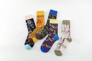 Detail of five crew socks featuring Chinese style patterns like koi fish and floral ink prints