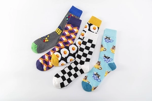 Detailed set of cotton crew socks featuring fried egg, checkered, and geometric patterns