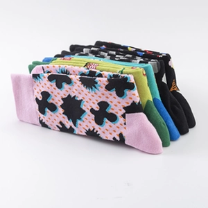 Set of colorful cotton crew socks featuring vibrant patterns and ribbed cuffs for daily wear