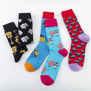 Colorful crew socks with guitar, tiger, and Rubik's cube patterns in a cotton blend
