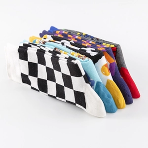 Colorful crew socks set with checkerboard and polka dot patterns in soft cotton blend