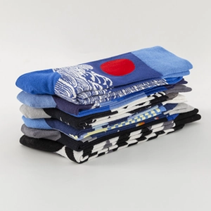 Stack of colorful patterned cotton crew socks including Japanese wave and stripe designs