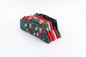 Detailed view of colorful Christmas cotton socks with festive snowflake and reindeer patterns