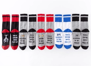 Variety pack of cotton sports socks with funny alcoholic drink request text on soles