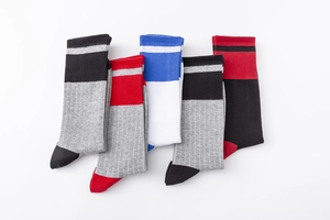 Detailed close-up of 5-pack ribbed cotton athletic crew socks with striped cuff patterns