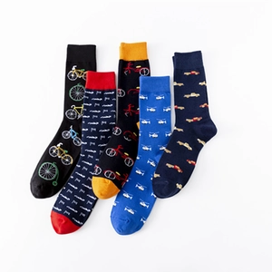 Five pairs of colorful men's cotton crew socks with fun vehicle and abstract patterns