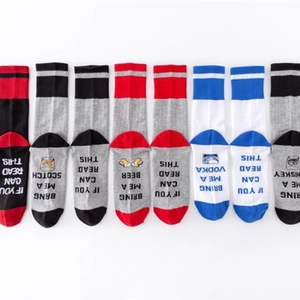 Funny cotton crew socks with novelty wine and beer text on bottom in multiple colors