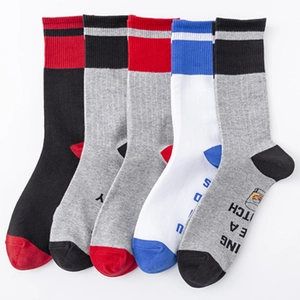 Five pairs of colorful ribbed cotton athletic crew socks with stylish letter patterns