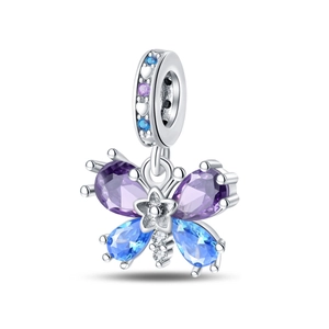 Detailed view of a butterfly pendant charm with colorful crystals and heart cutouts