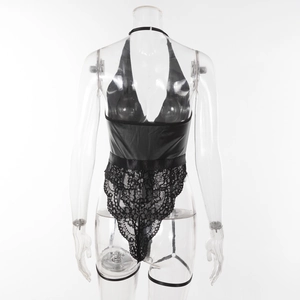 Detail of black teddy bodysuit featuring halter neck, PU leather and floral lace textures