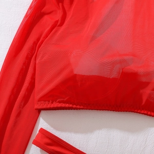 Detailed macro view of red mesh fabric texture and zigzag stitching on sexy lingerie set