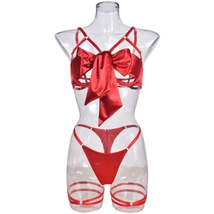 Three-piece red lingerie set with underwire, satin bow, and matching leg garters