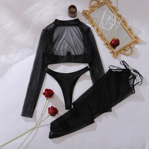 Flat lay of black sheer mesh 3-piece lingerie set with top, thong and skirt