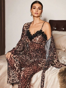 Detailed view of women's leopard print 3-piece pajama set with elegant 3D floral accents