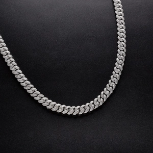 Macro shot of 10mm silver Cuban link chain with micro-pave cubic zirconia crystals