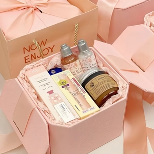 Premium pink textured gift packaging box with elegant ribbon for birthday and souvenirs