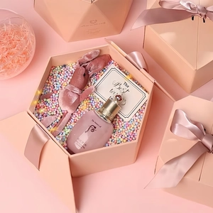 Luxury skincare gift box with pink cosmetics, plush rabbit, and best wishes card