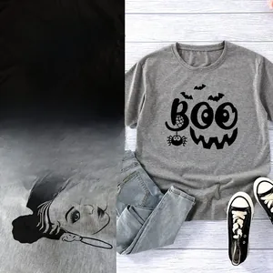 Close-up of artistic female face line print on a casual grey round neck sweatshirt