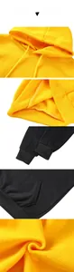 Close-up of hoodie features including fleece lining, drawstring hood, and kangaroo pocket