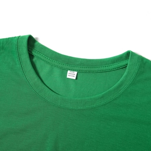 Detailed view of the ribbed crew neck and size tag on a green cotton love print T-shirt